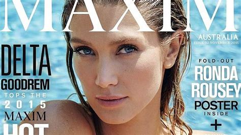 Delta Goodrem poses TOPLESS as shes named。